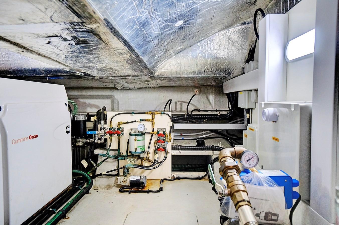 a large white machine with wires aboard ONCE AROUND Yacht for Sale