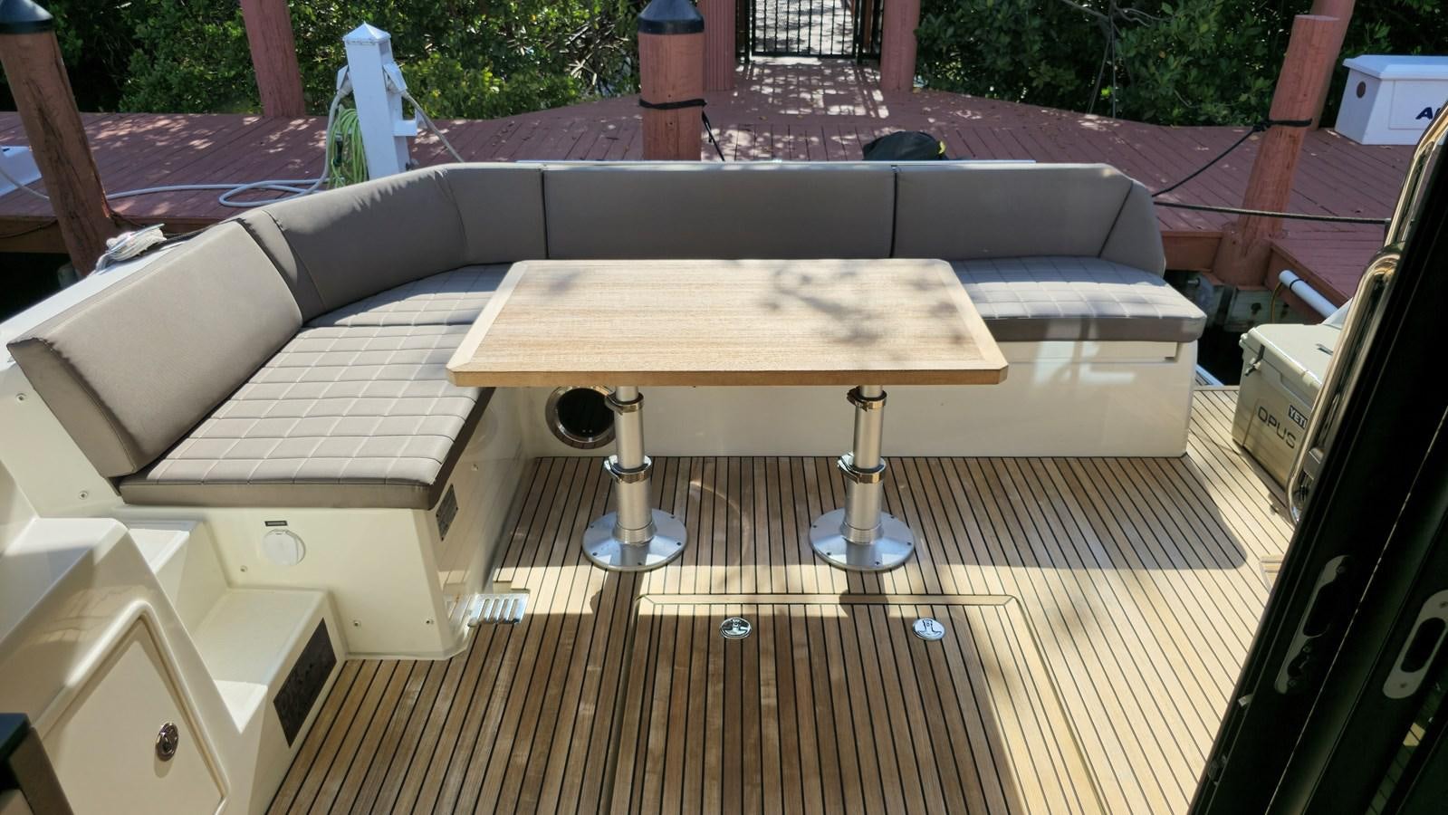a table with a metal bar on it aboard OPUS ONE Yacht for Sale