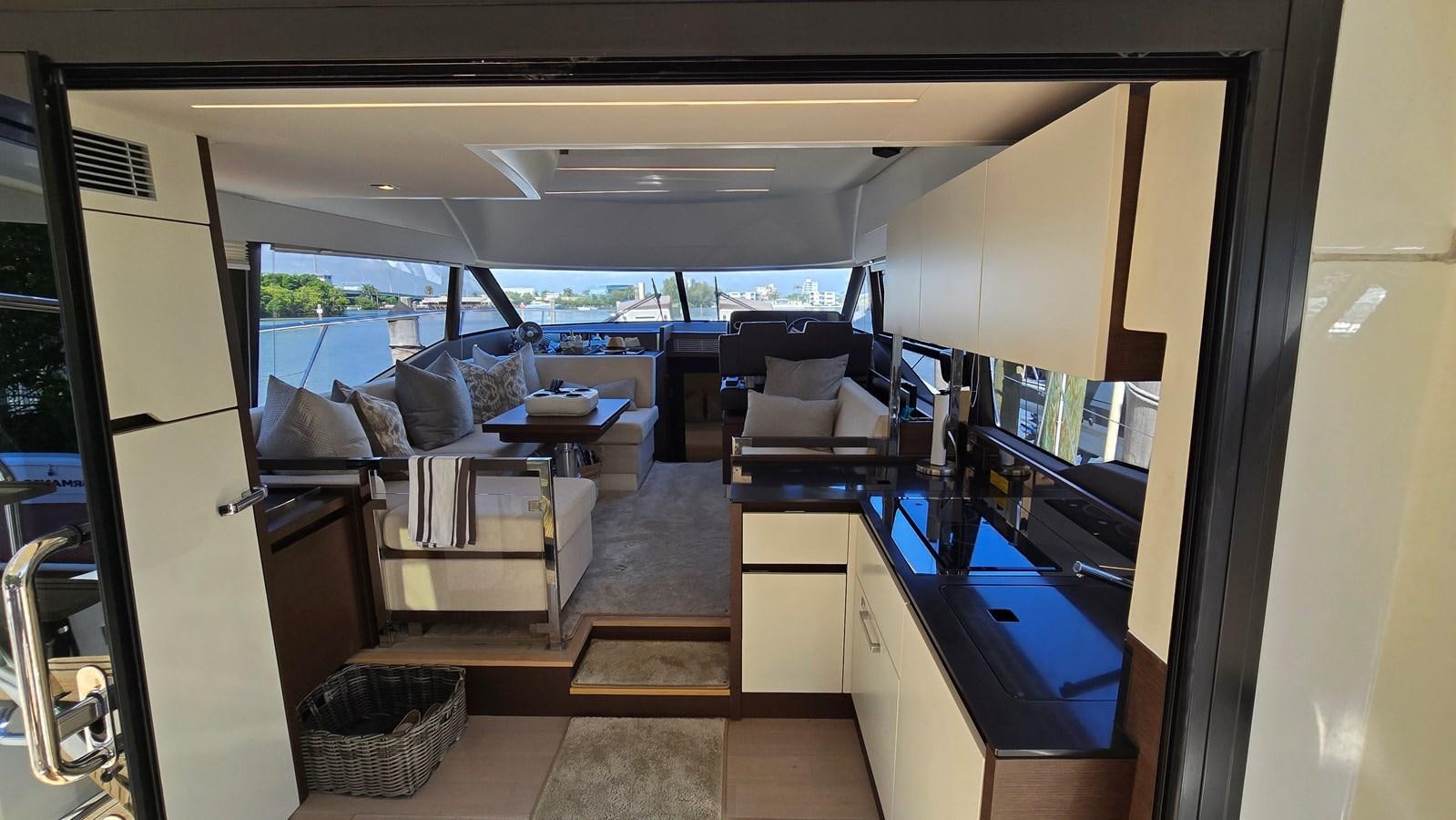 a room with a table and chairs aboard OPUS ONE Yacht for Sale