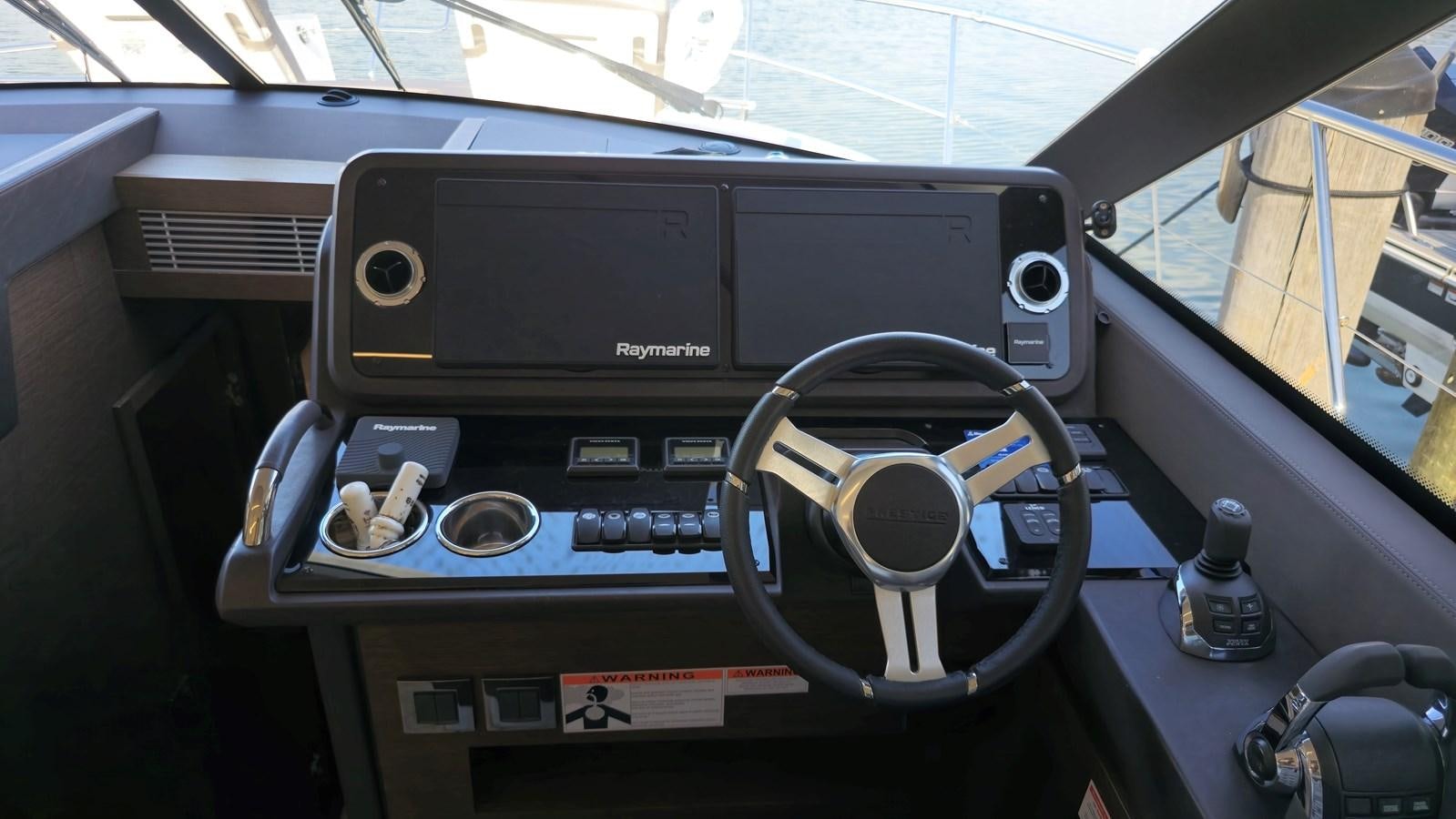 a black and silver console with a black console and a black console aboard OPUS ONE Yacht for Sale