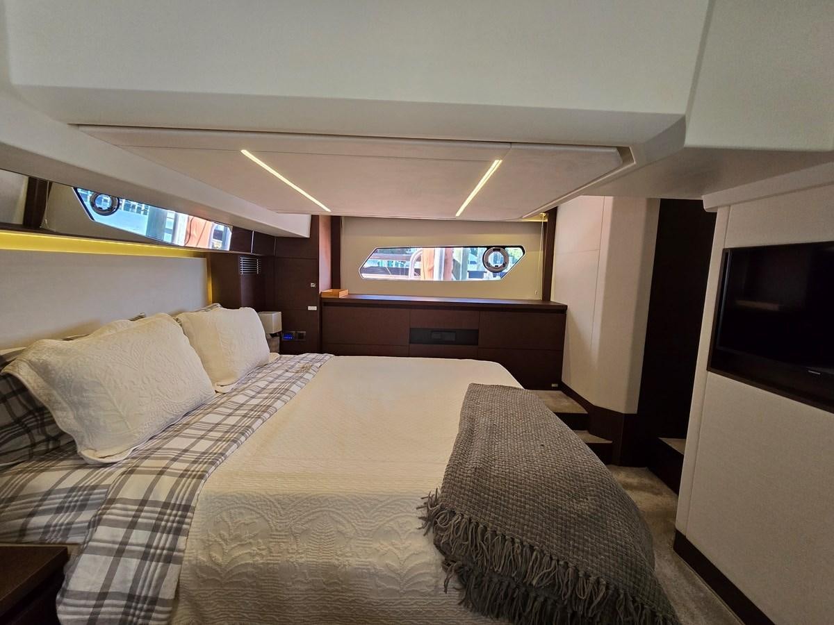 a room with two beds aboard OPUS ONE Yacht for Sale