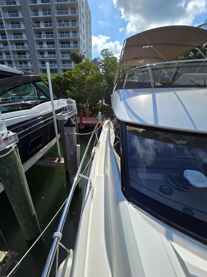 a group of cars parked in a parking lot aboard OPUS ONE Yacht for Sale