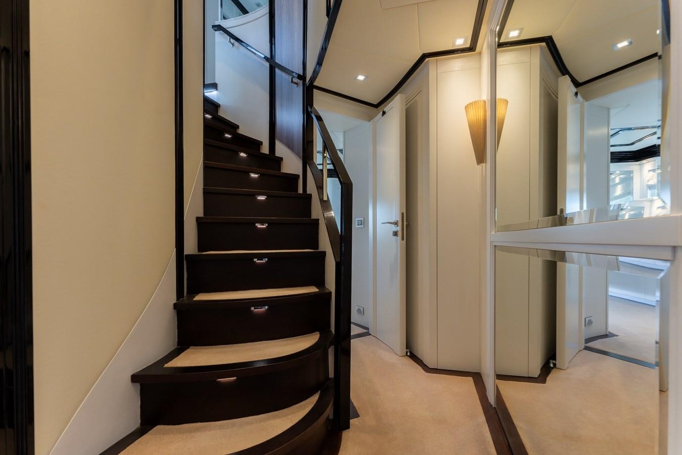 a staircase in a building aboard DOMUS Yacht for Sale