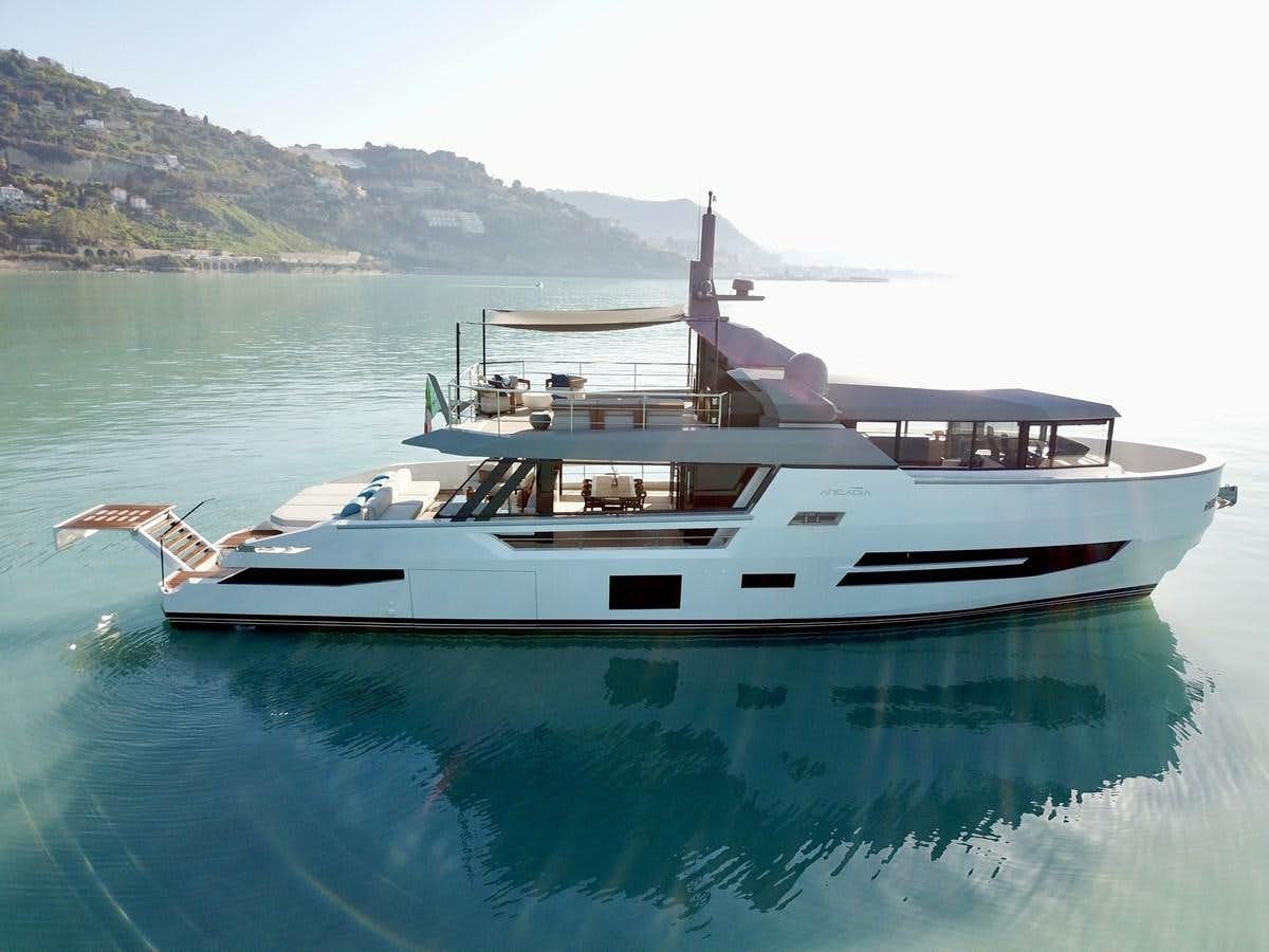 a white boat on the water aboard SHERPA 80 Yacht for Sale