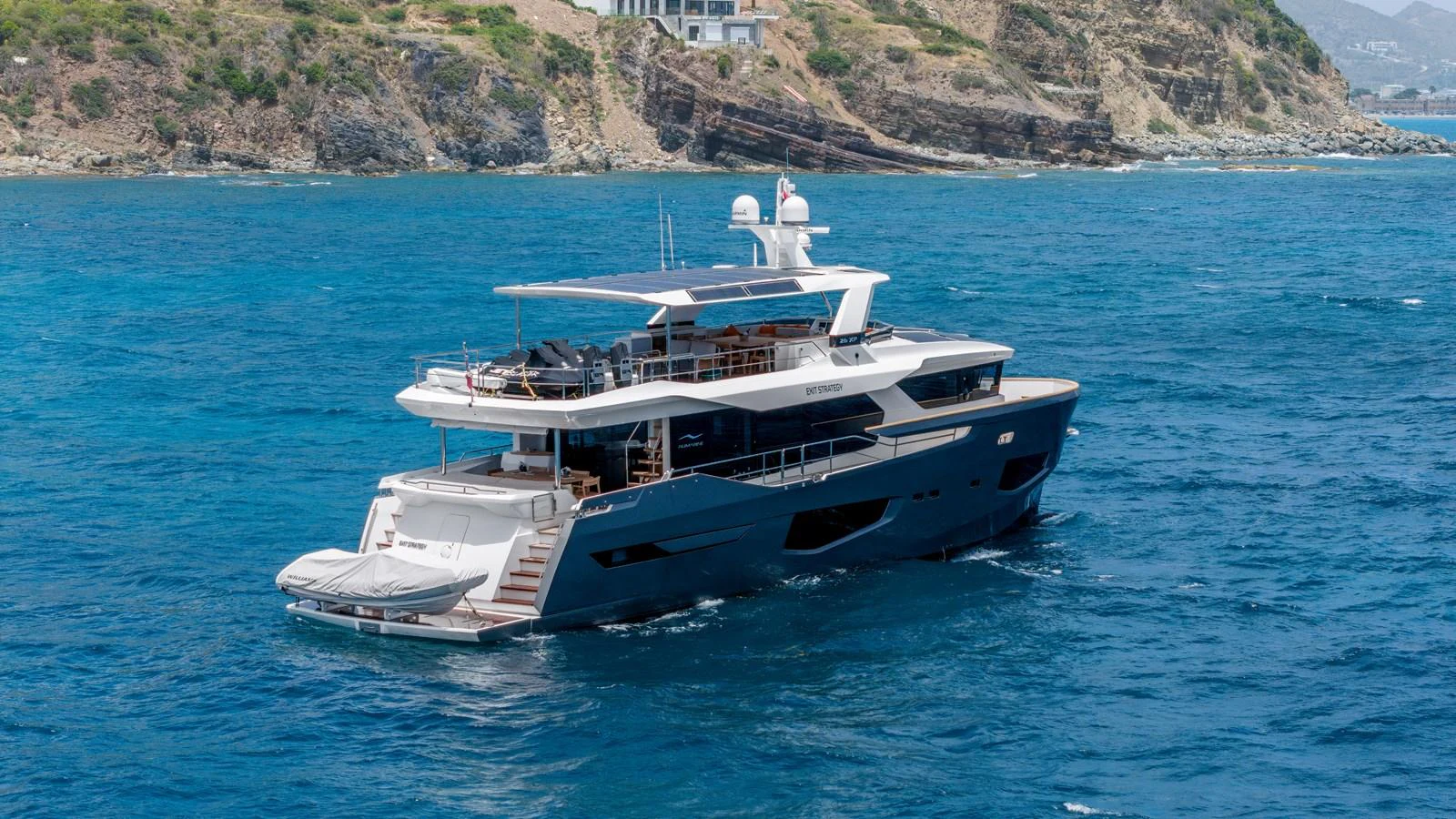 a boat on the water aboard EXIT STRATEGY Yacht for Sale
