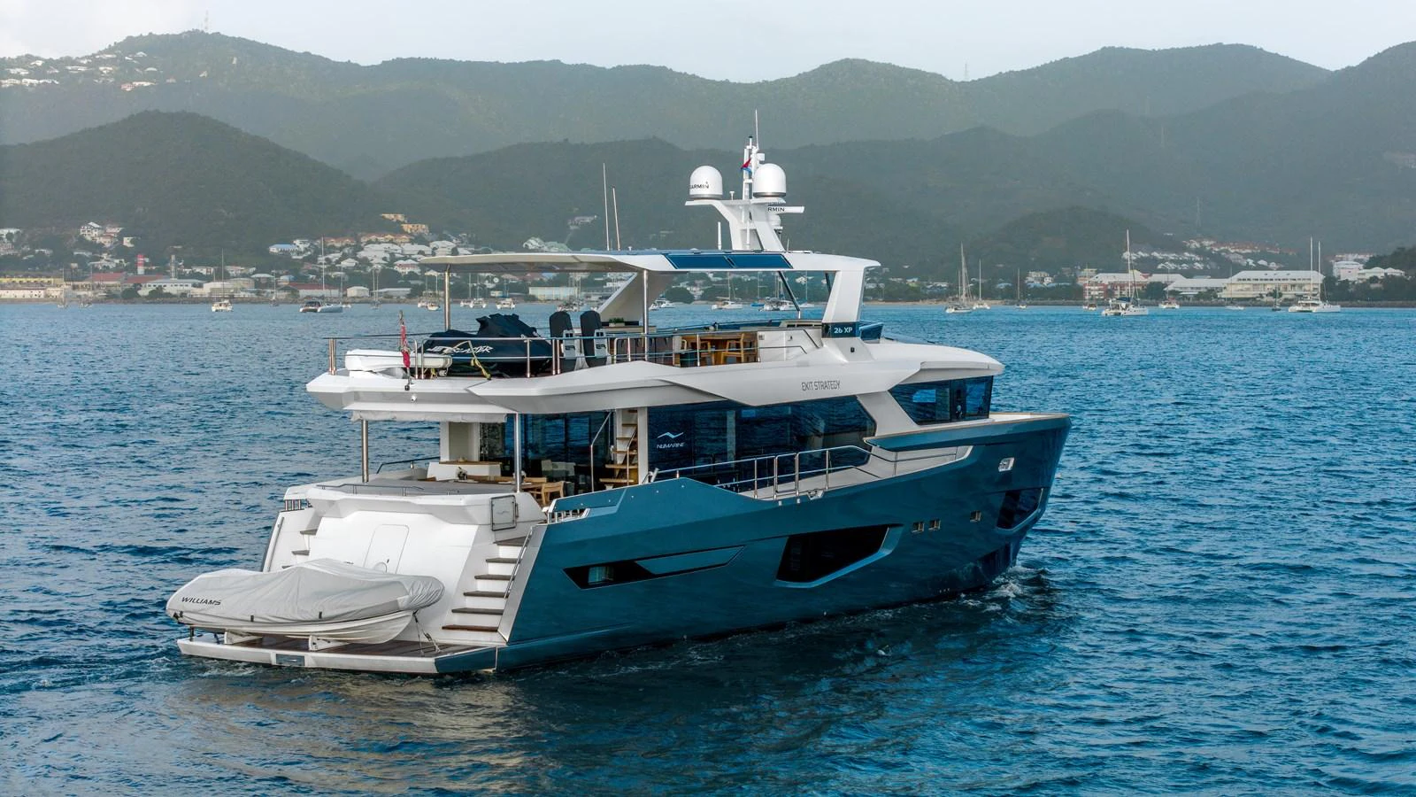 a boat in the water aboard EXIT STRATEGY Yacht for Sale