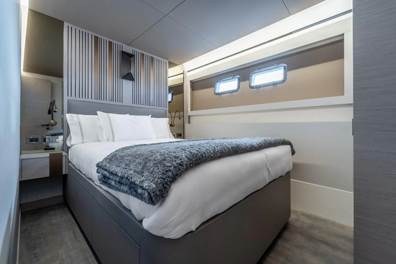 a bed in a room aboard EXIT STRATEGY Yacht for Sale