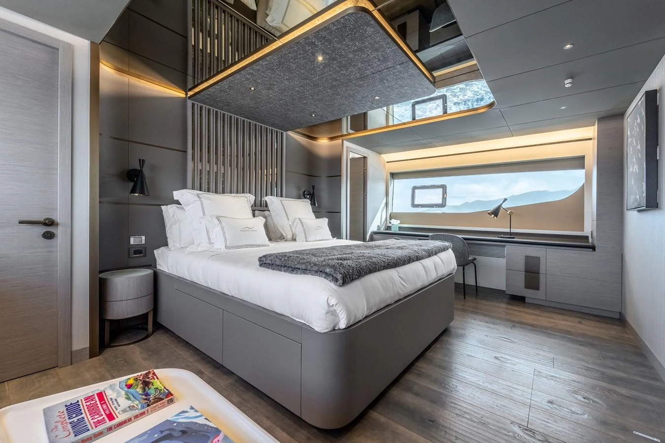 a large bedroom with a large bed aboard EXIT STRATEGY Yacht for Sale