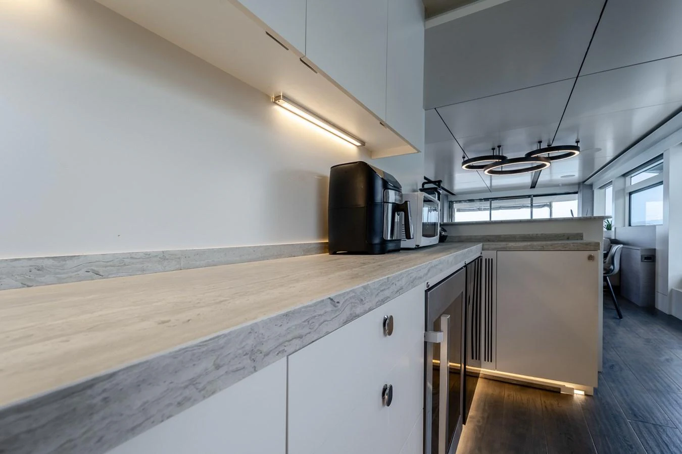 a kitchen with a coffee maker aboard EXIT STRATEGY Yacht for Sale
