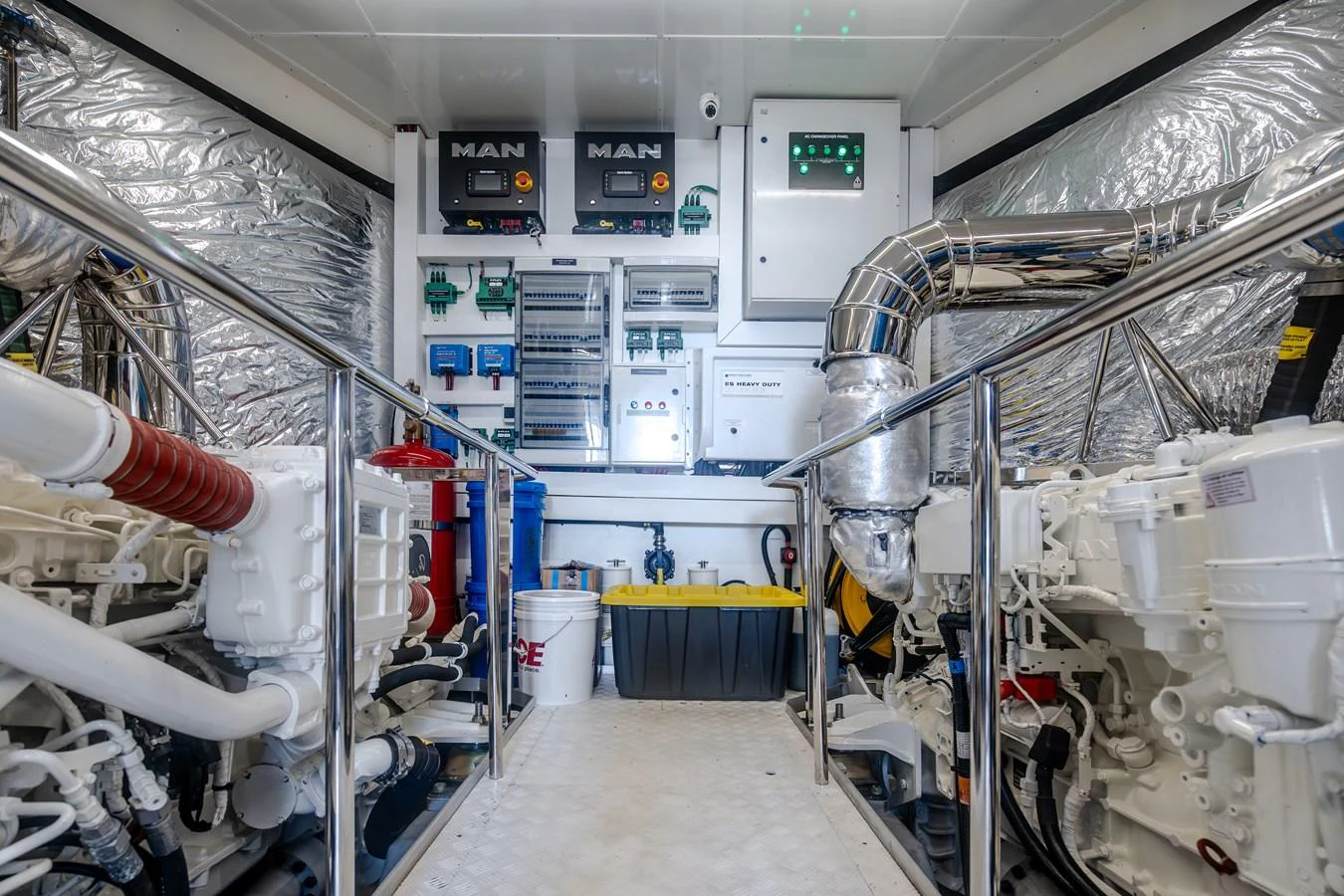 a room with several white pipes aboard EXIT STRATEGY Yacht for Sale