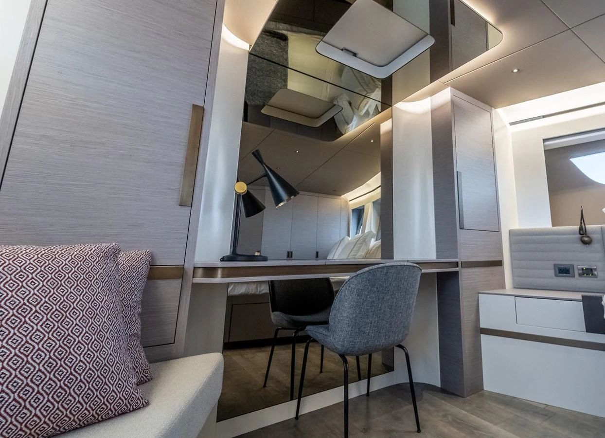 a room with a desk and a chair aboard EXIT STRATEGY Yacht for Sale