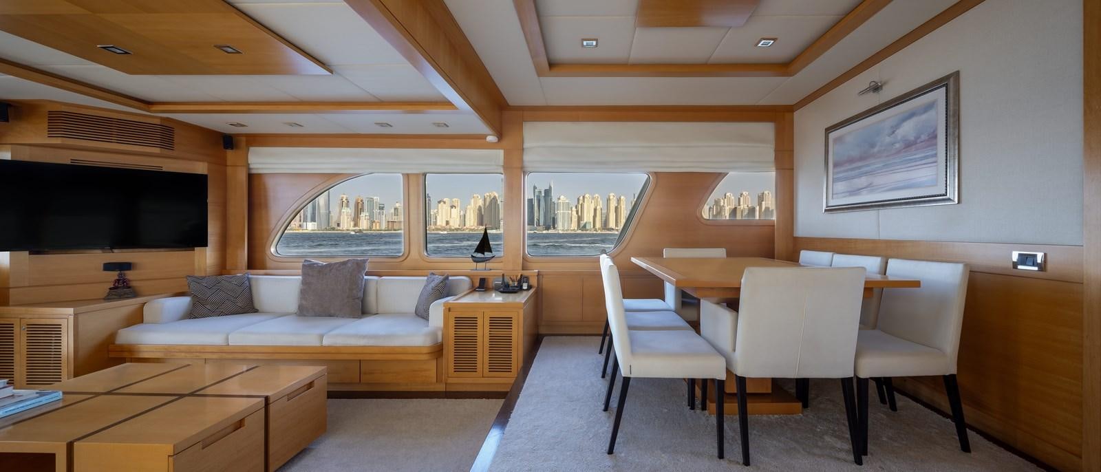 a living room with a couch and a tv aboard ANTALYA Yacht for Sale