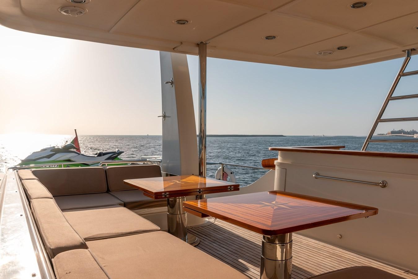 a table and chairs on a boat aboard ANTALYA Yacht for Sale