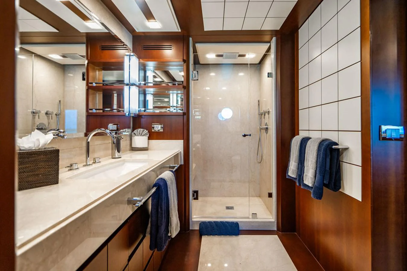 a bathroom with a sink and a shower aboard BM Yacht for Sale