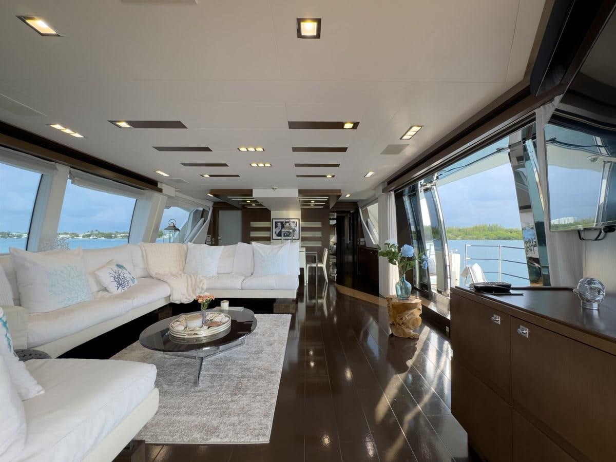 a living room with a large window aboard WHITE PEARL Yacht for Sale