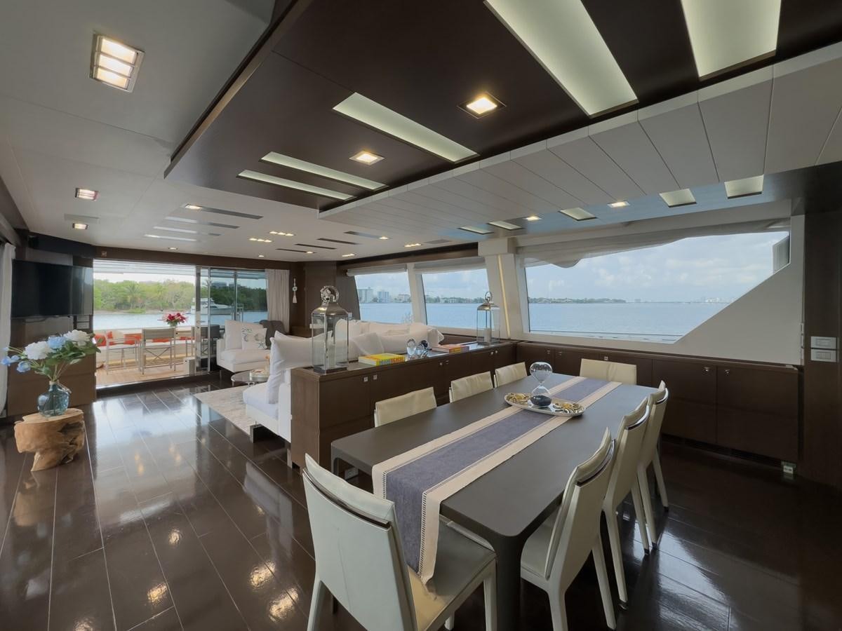 a room with tables and chairs aboard WHITE PEARL Yacht for Sale
