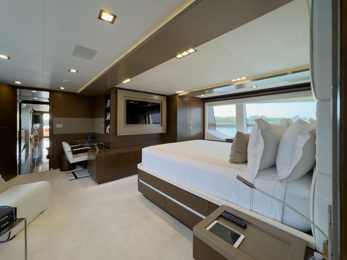 a room with a bed and a tv aboard WHITE PEARL Yacht for Sale