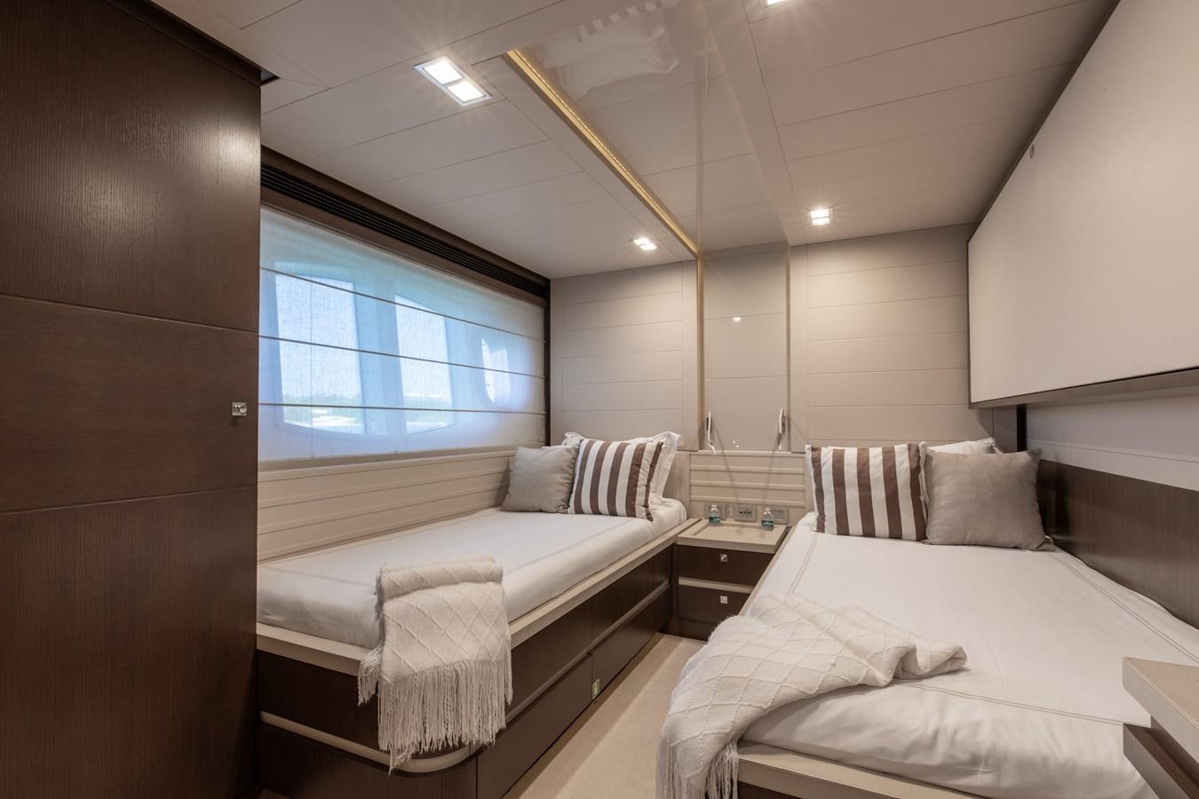 a room with two beds aboard WHITE PEARL Yacht for Sale