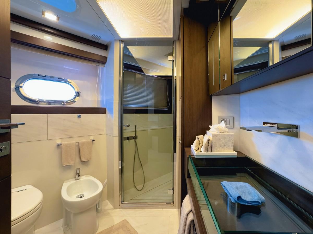 a bathroom with a glass shower aboard WHITE PEARL Yacht for Sale