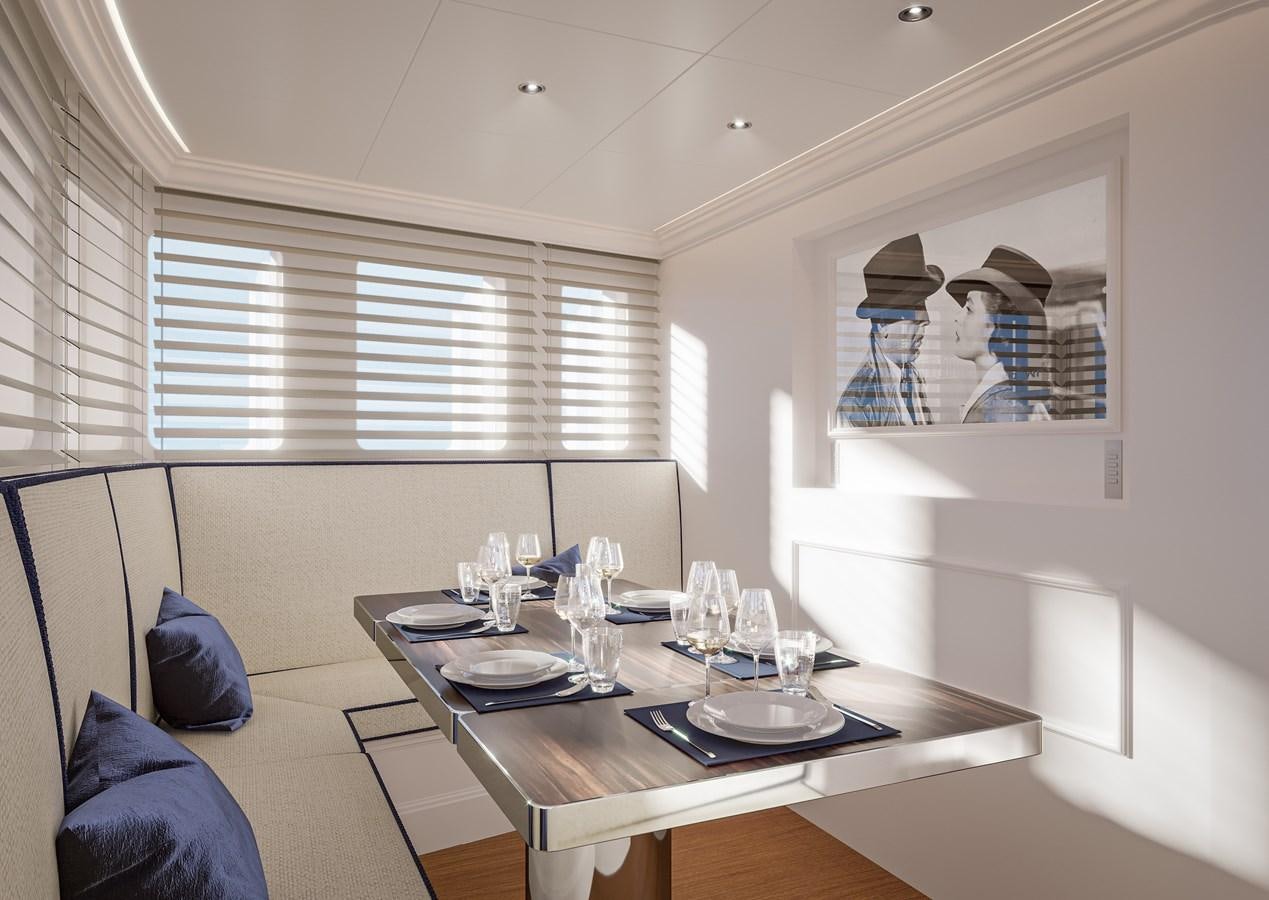 a dining table in a room aboard GENTLEMAN 24M Yacht for Sale