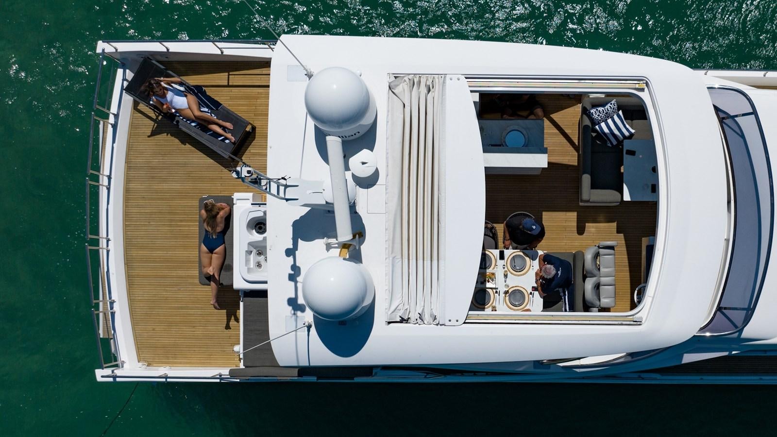 a person standing in a white vehicle aboard SOLACE Yacht for Sale
