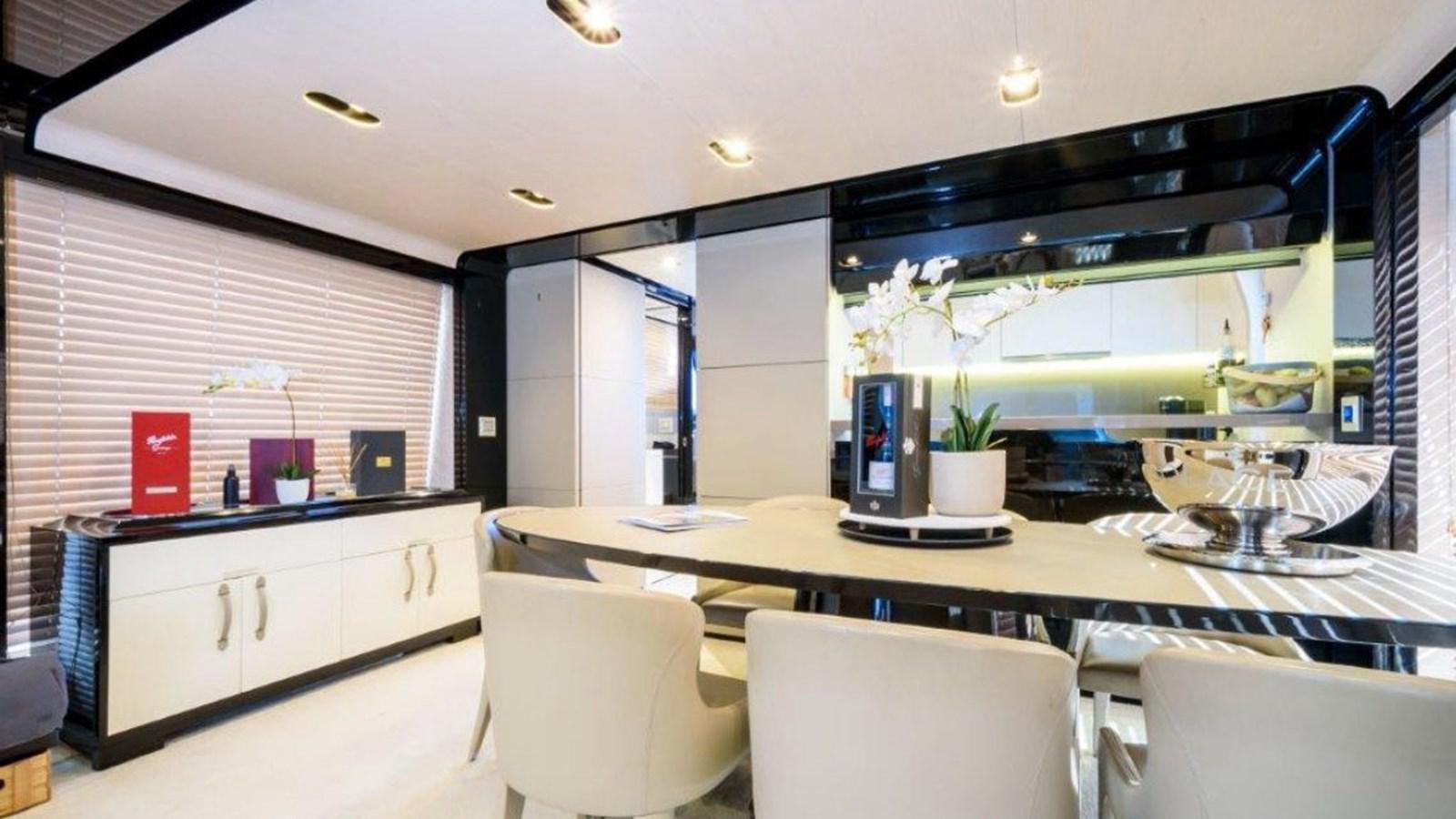 a kitchen with a large island aboard SOLACE Yacht for Sale
