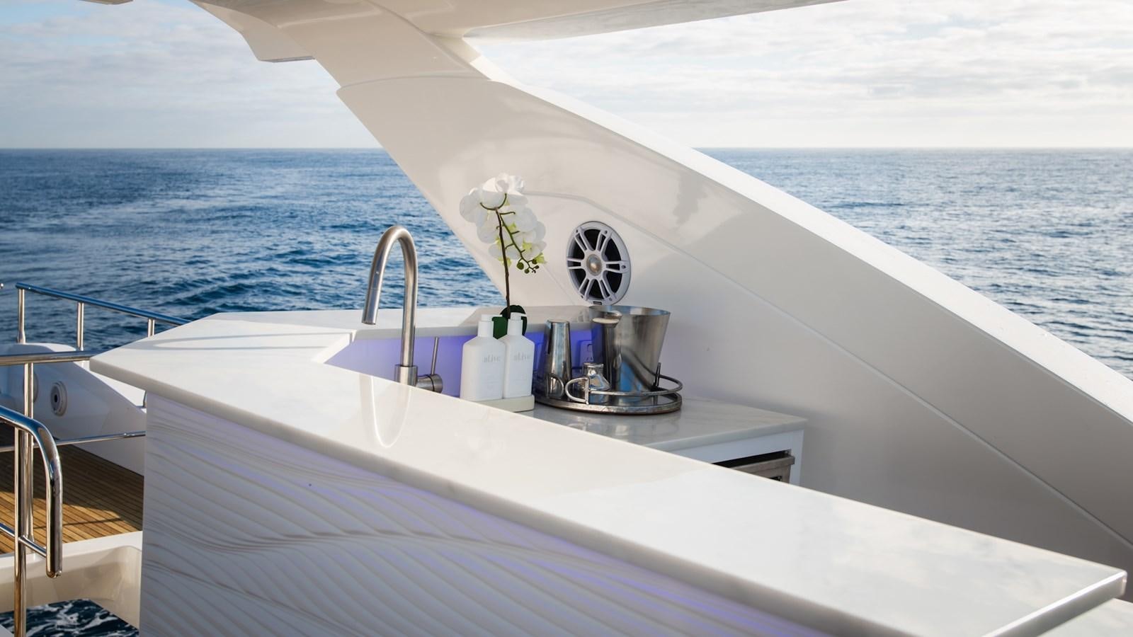 a boat with a sink and faucet on the front aboard SOLACE Yacht for Sale