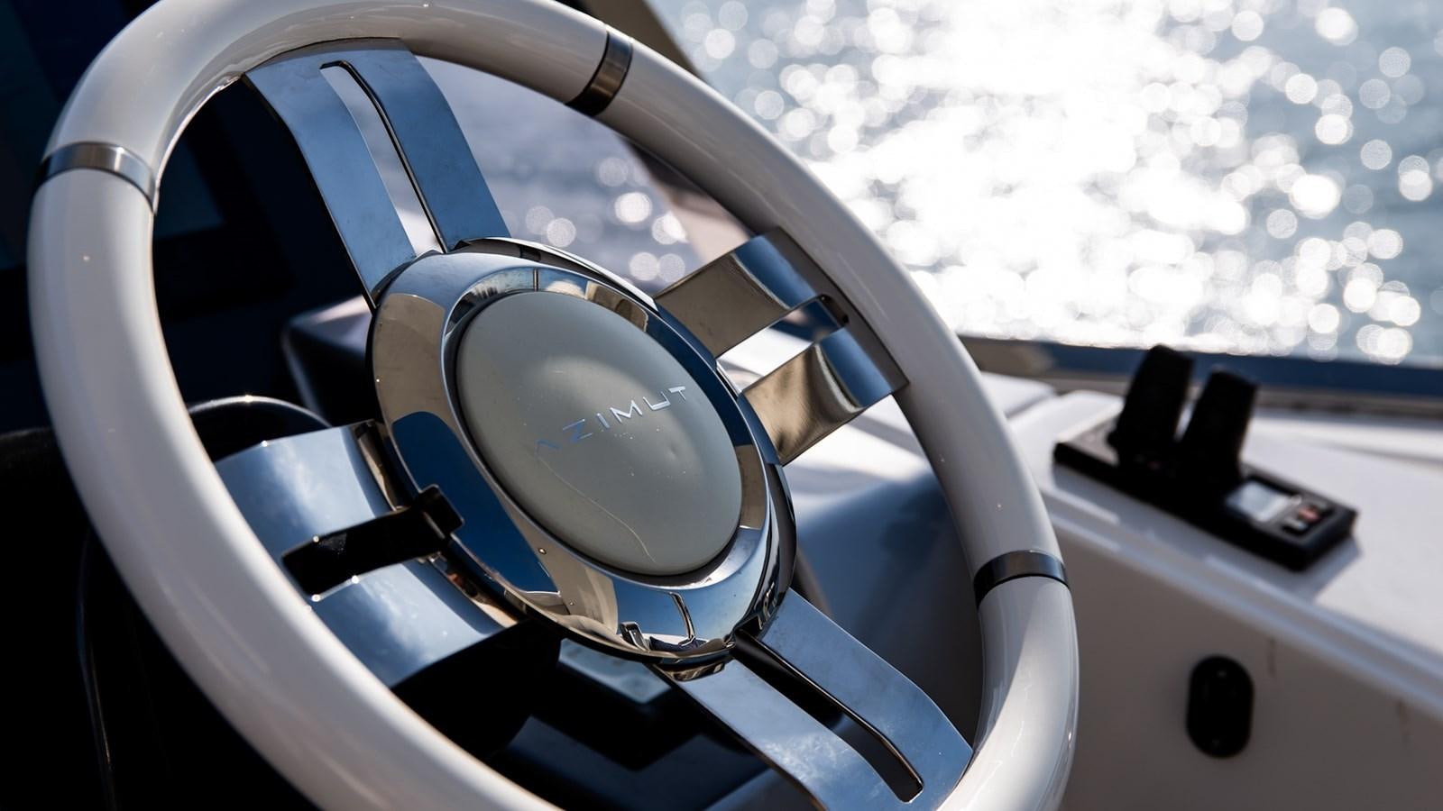 a pair of headphones on a white surface aboard SOLACE Yacht for Sale