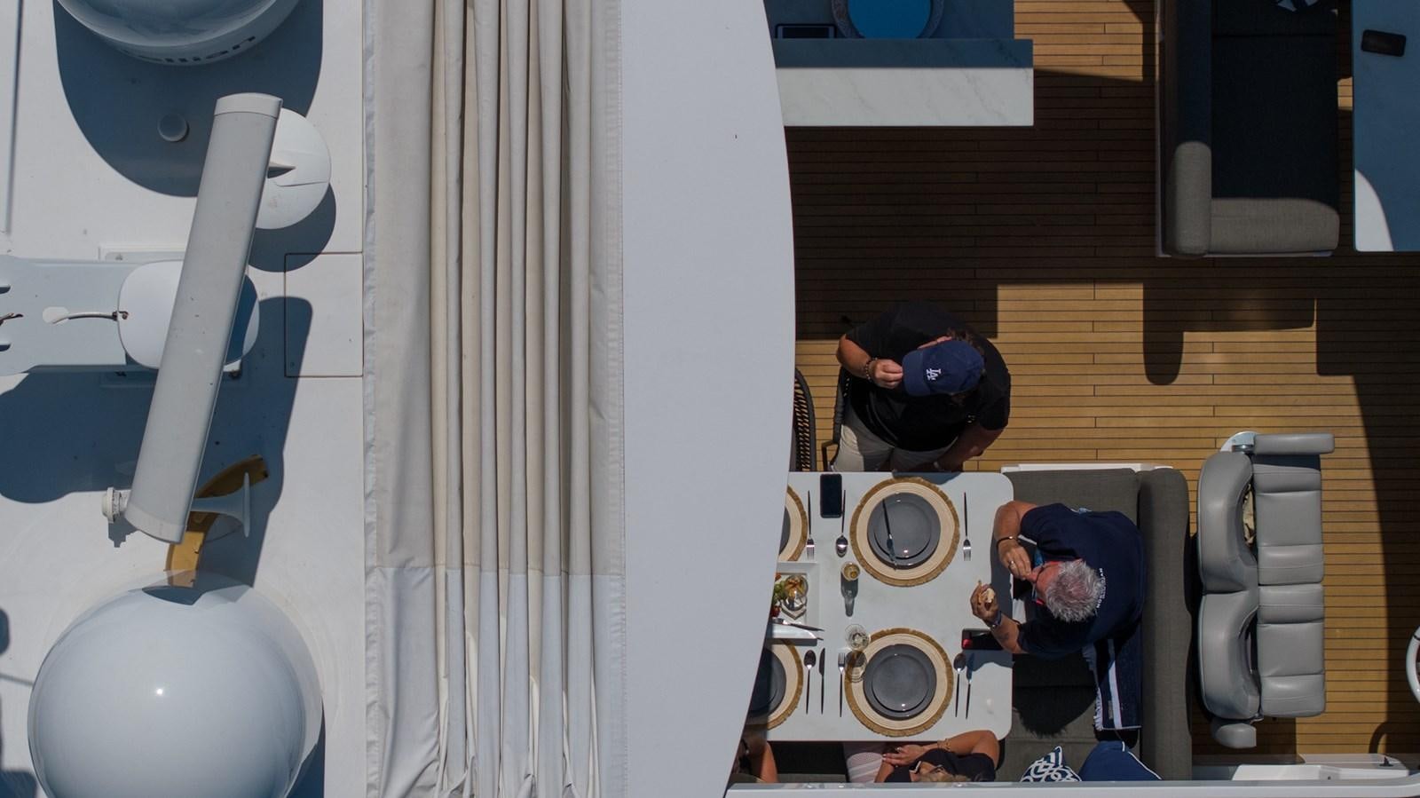 a person standing in a room aboard SOLACE Yacht for Sale
