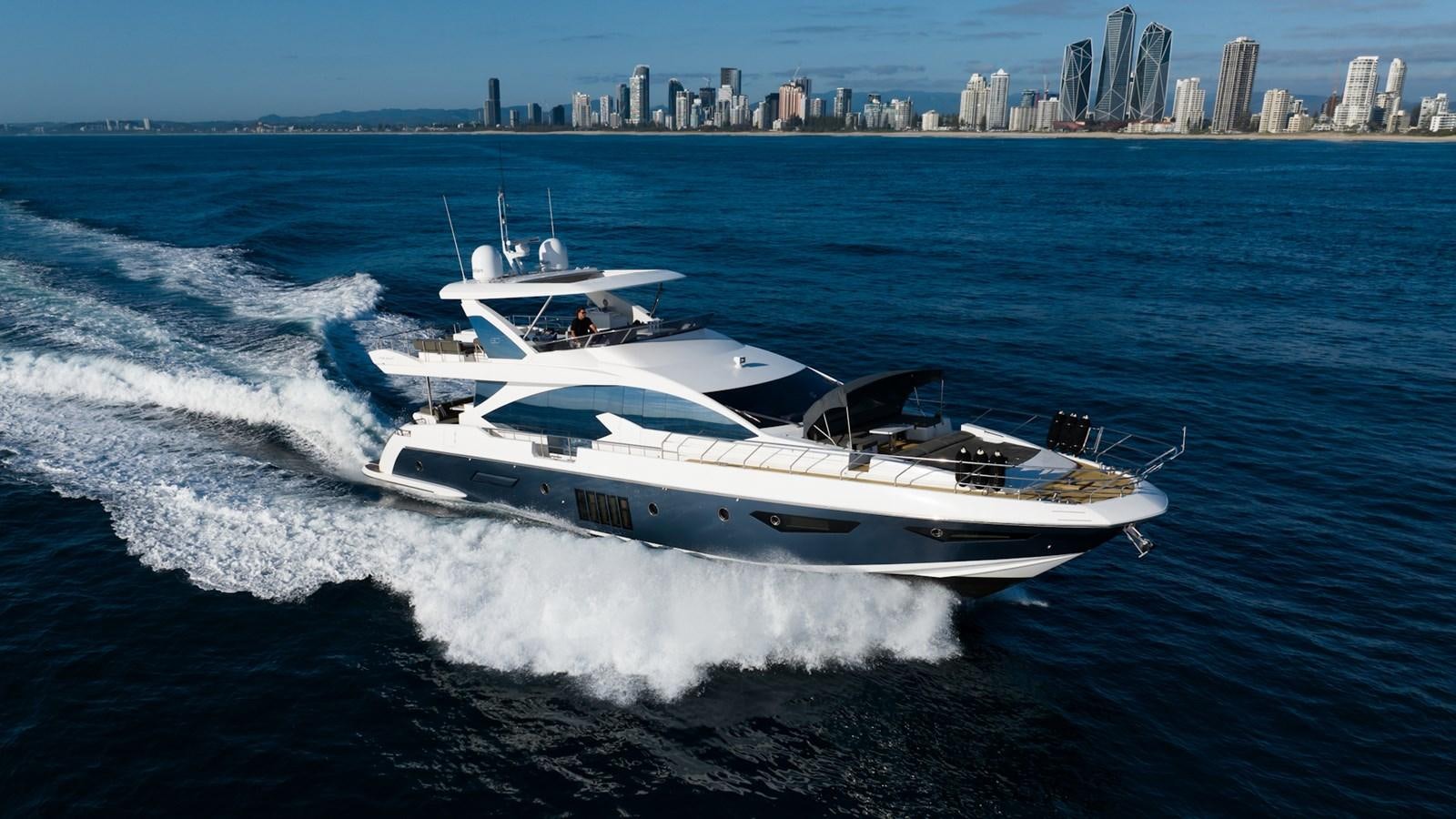 a white yacht on the water aboard SOLACE Yacht for Sale