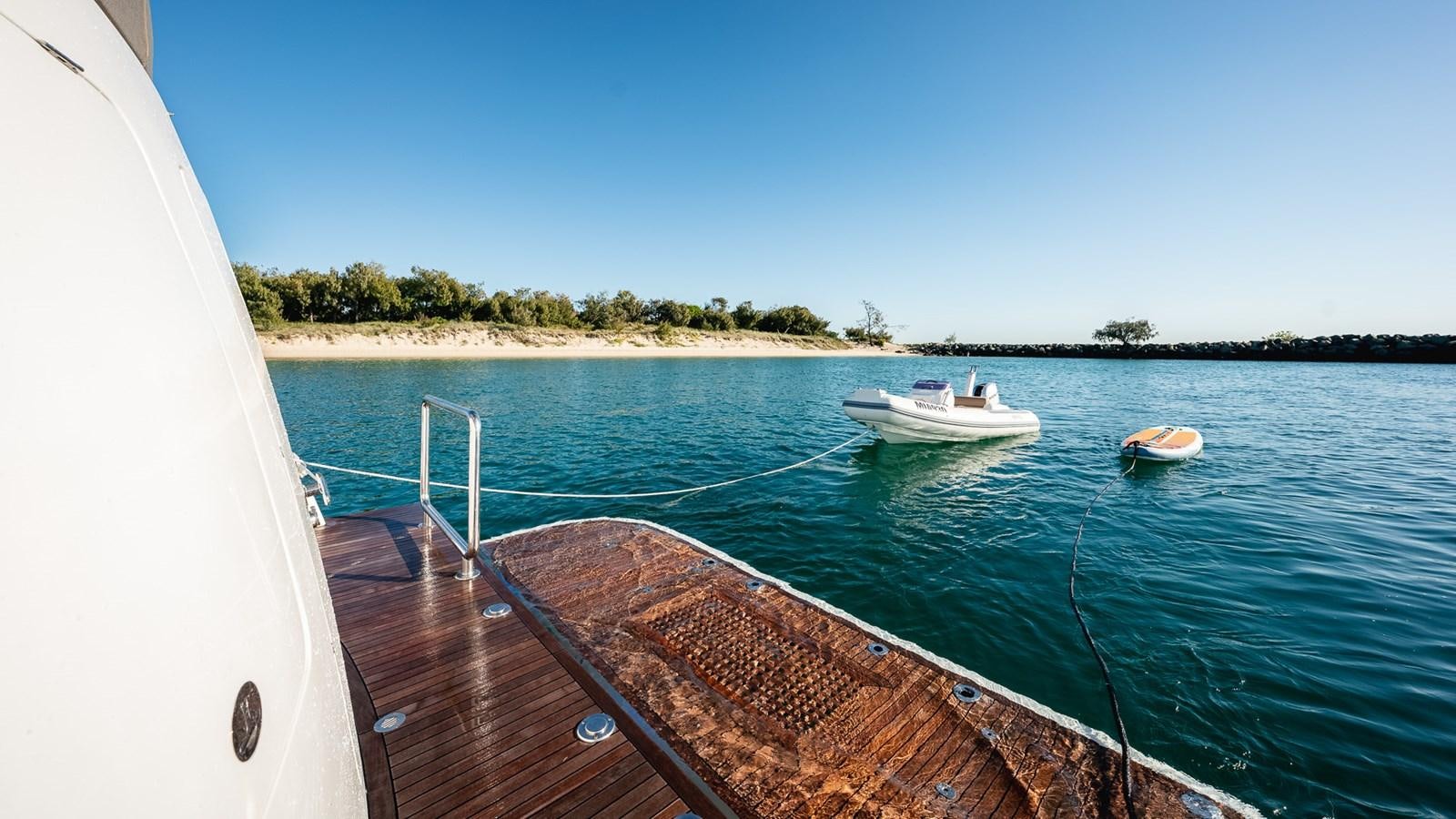 a boat on the water aboard OHANA Yacht for Sale