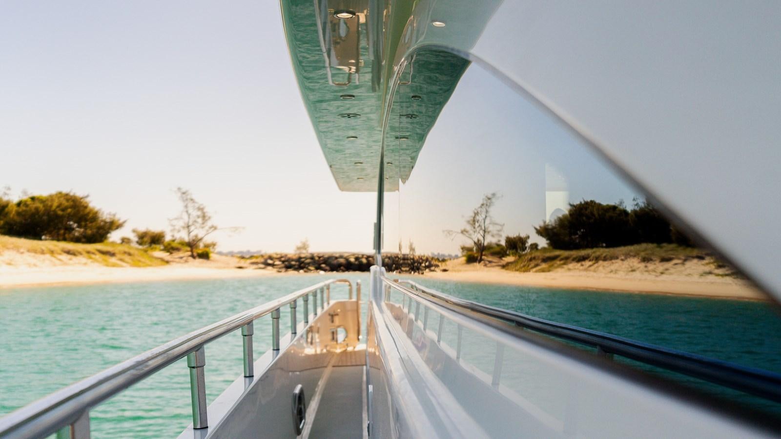 a boat on a body of water aboard OHANA Yacht for Sale