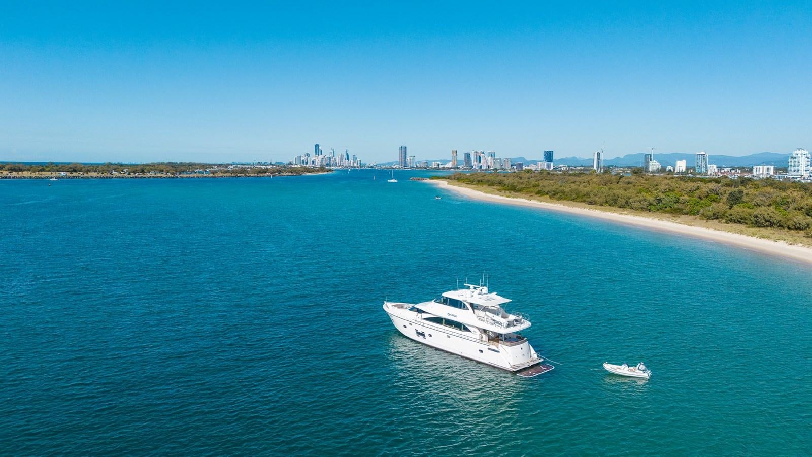 a boat sailing on the water aboard OHANA Yacht for Sale