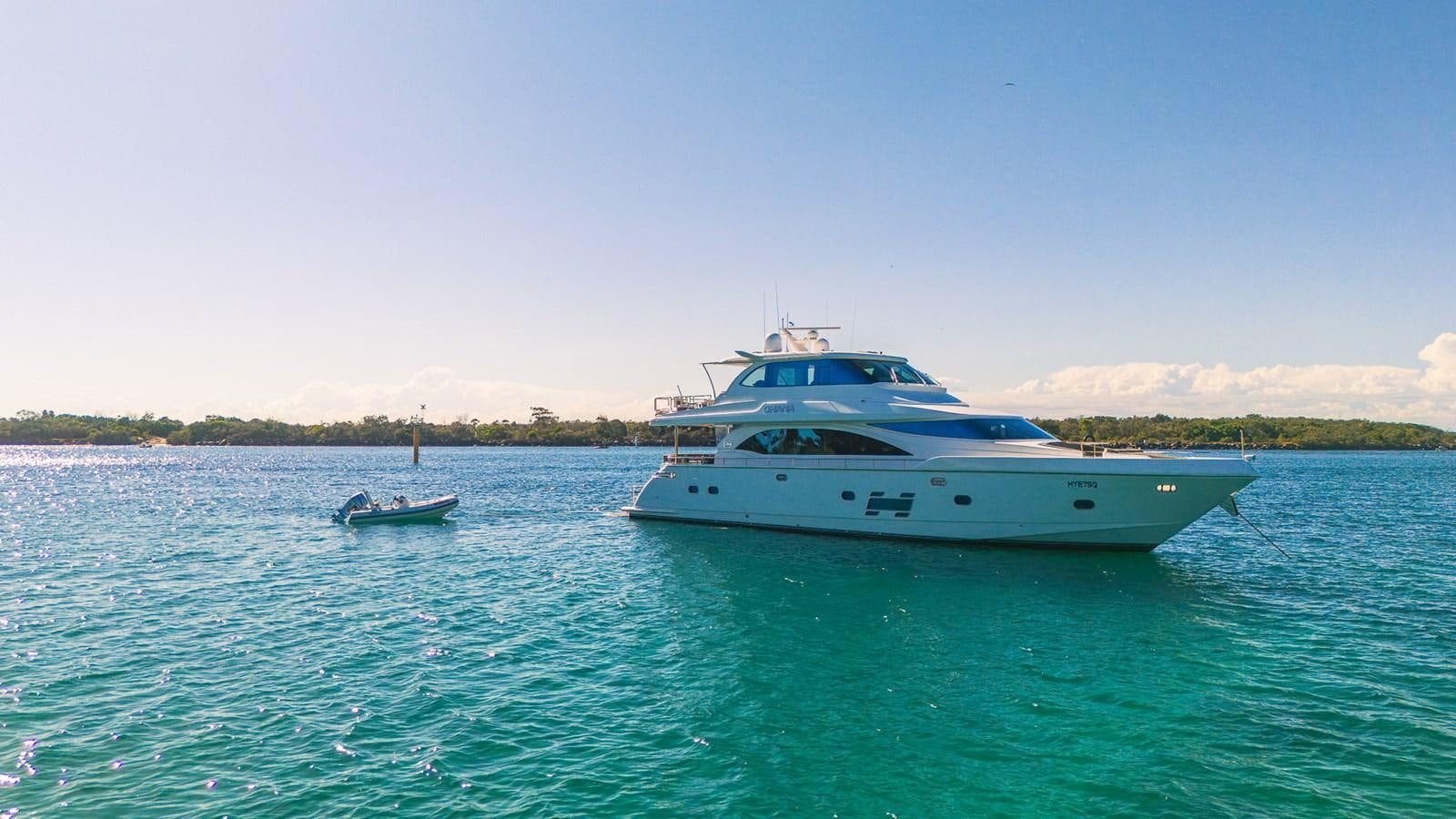 a couple of boats in the water aboard OHANA Yacht for Sale