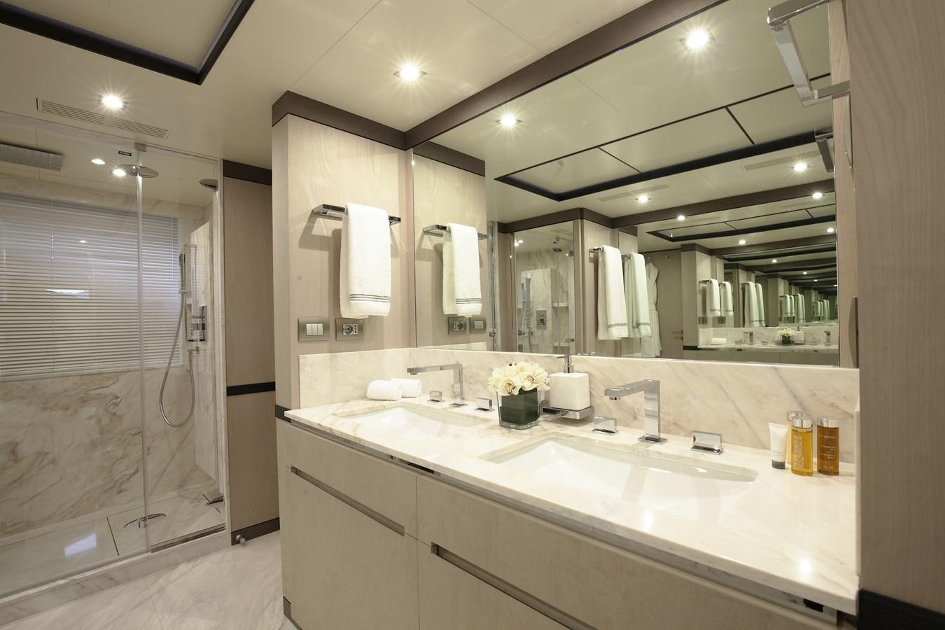a bathroom with a large mirror aboard WILLOW Yacht for Sale