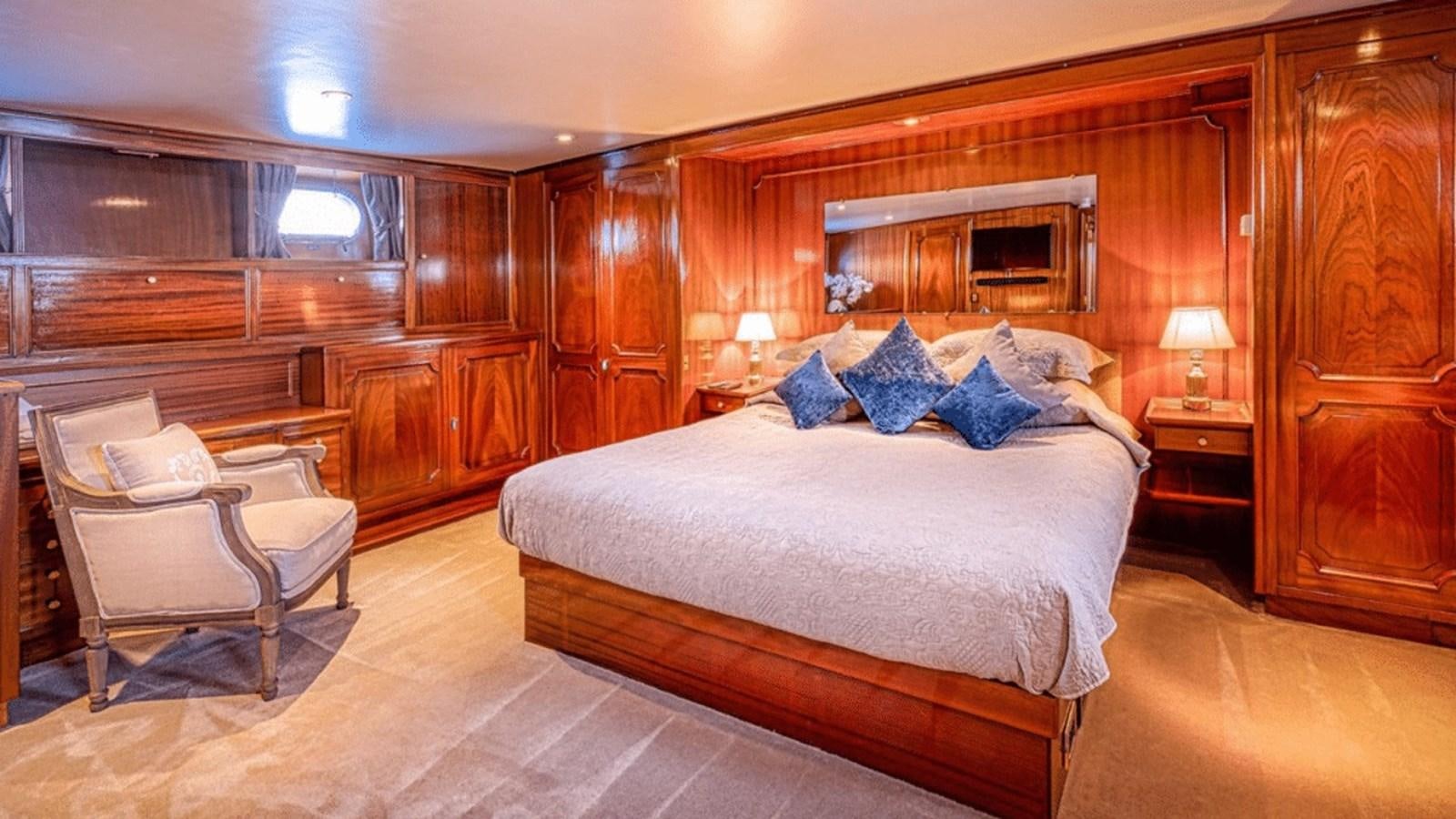 a bed in a room aboard CHANTELLA Yacht for Sale
