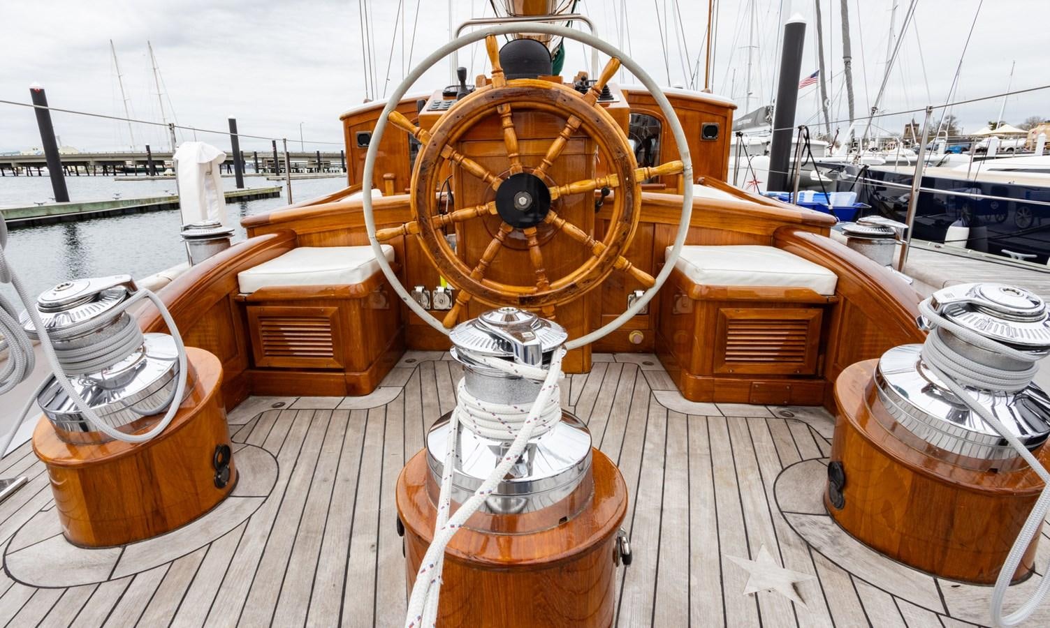 a boat with a large wheel aboard HERMITAGE Yacht for Sale
