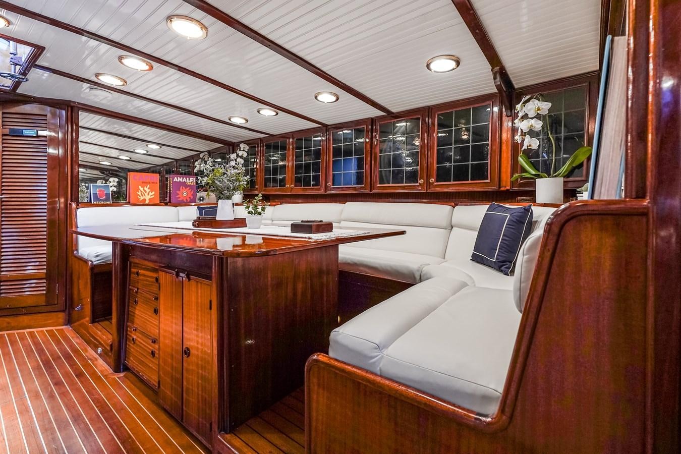a room with a couch and a table aboard HERMITAGE Yacht for Sale