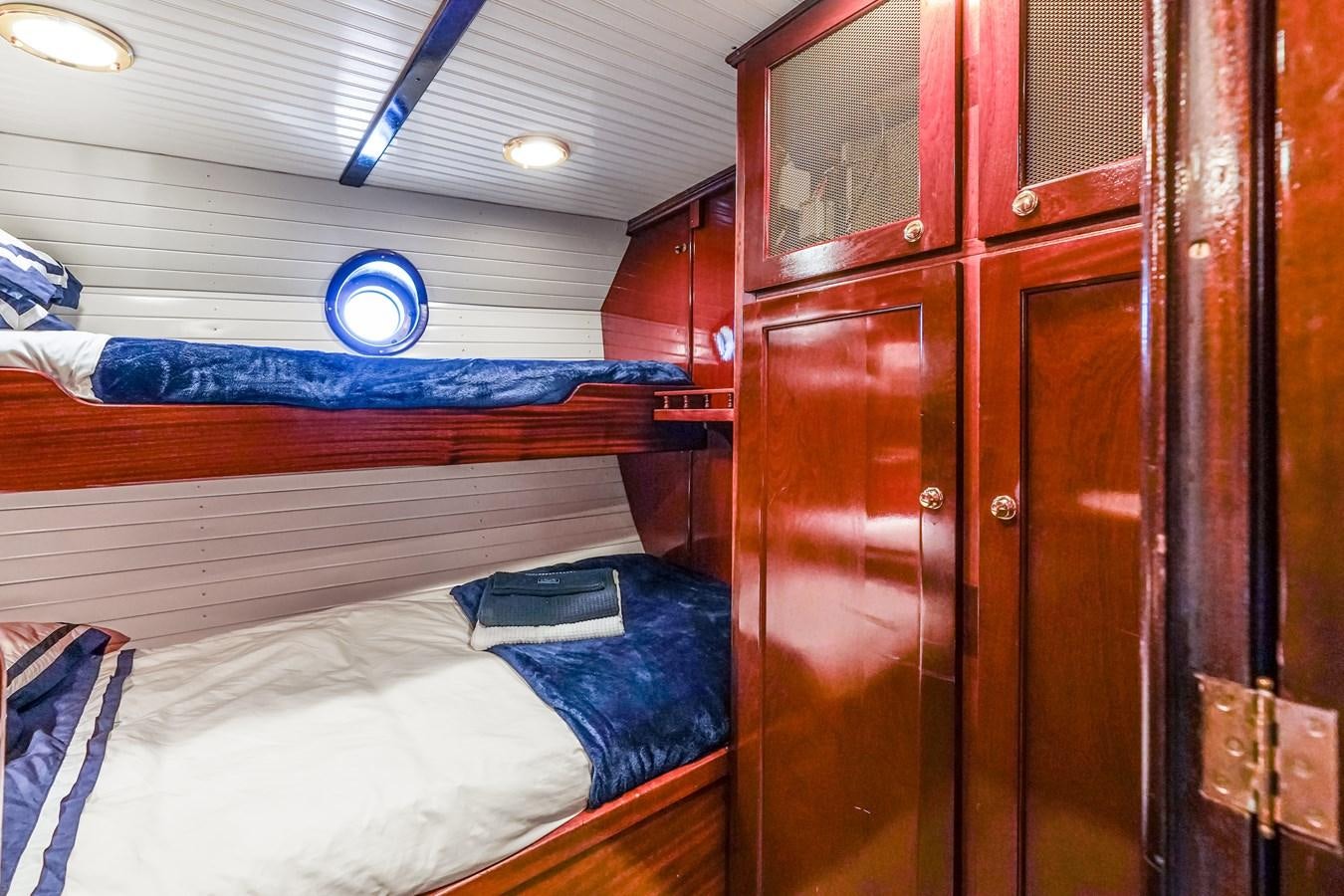 a room with bunk beds aboard HERMITAGE Yacht for Sale