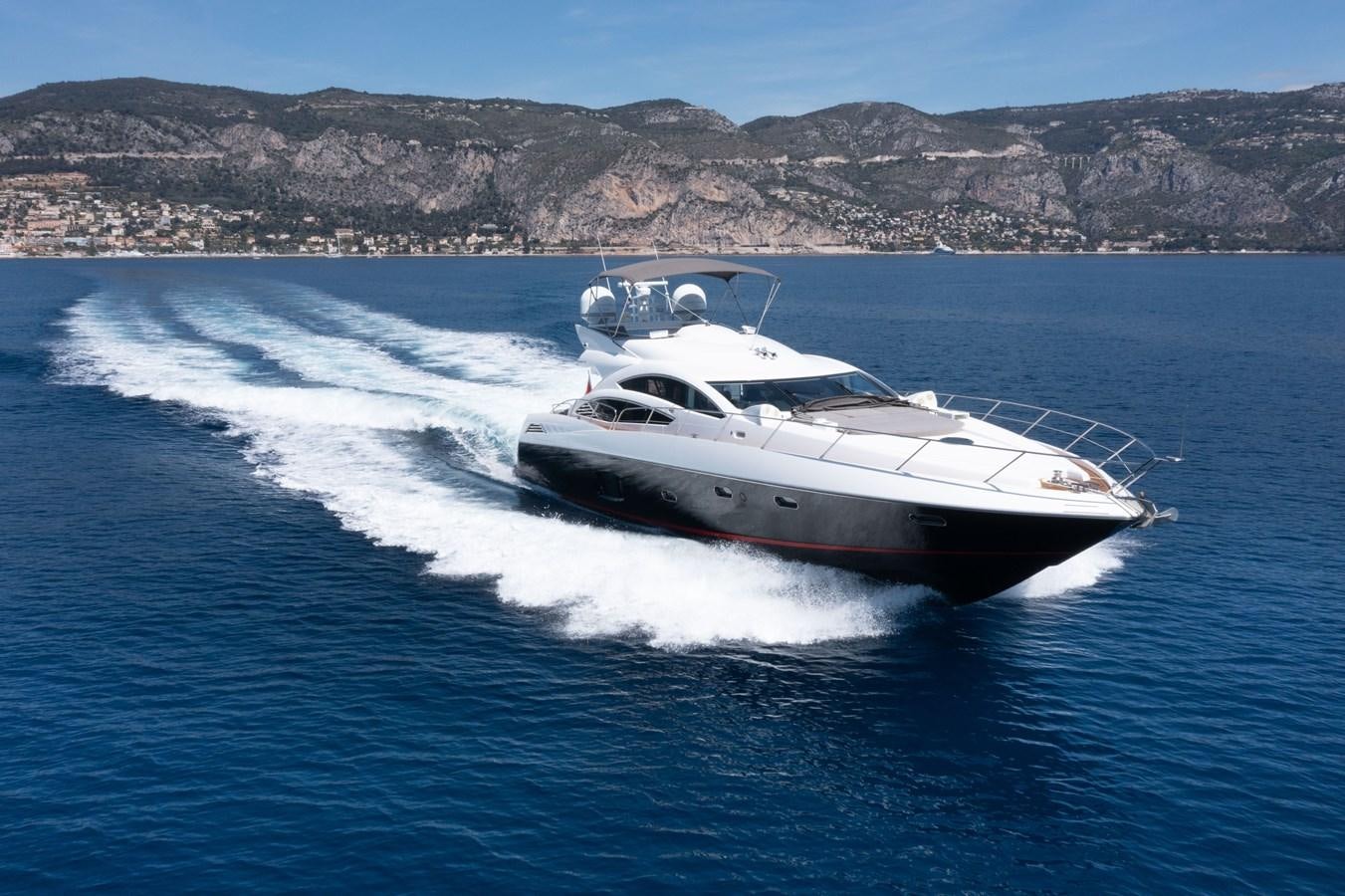 a white yacht on the water aboard STAR OF SEVEN SEAS Yacht for Sale