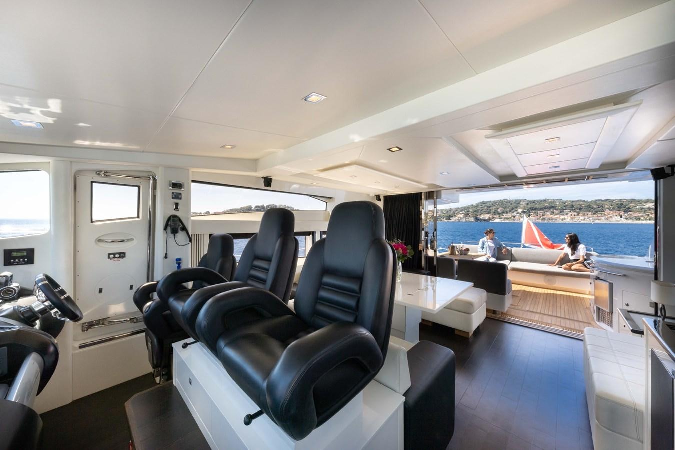 a room with a boat and a view of the water aboard STAR OF SEVEN SEAS Yacht for Sale