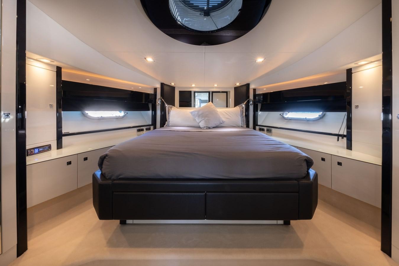 a bed in a room aboard STAR OF SEVEN SEAS Yacht for Sale