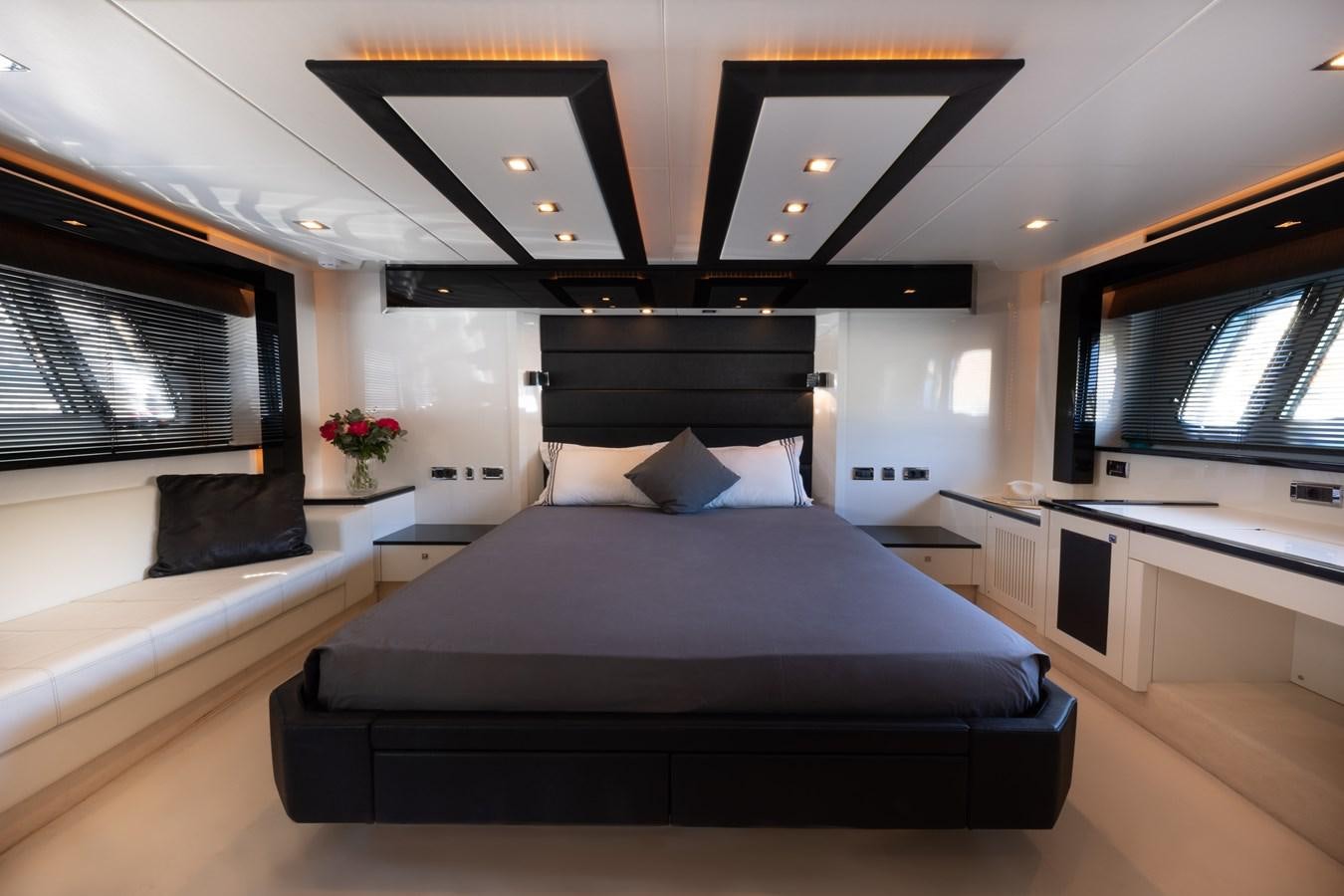 a bedroom with a bed aboard STAR OF SEVEN SEAS Yacht for Sale