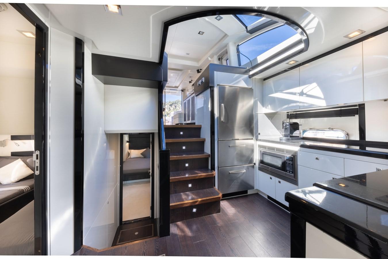 a room with a large glass door aboard STAR OF SEVEN SEAS Yacht for Sale