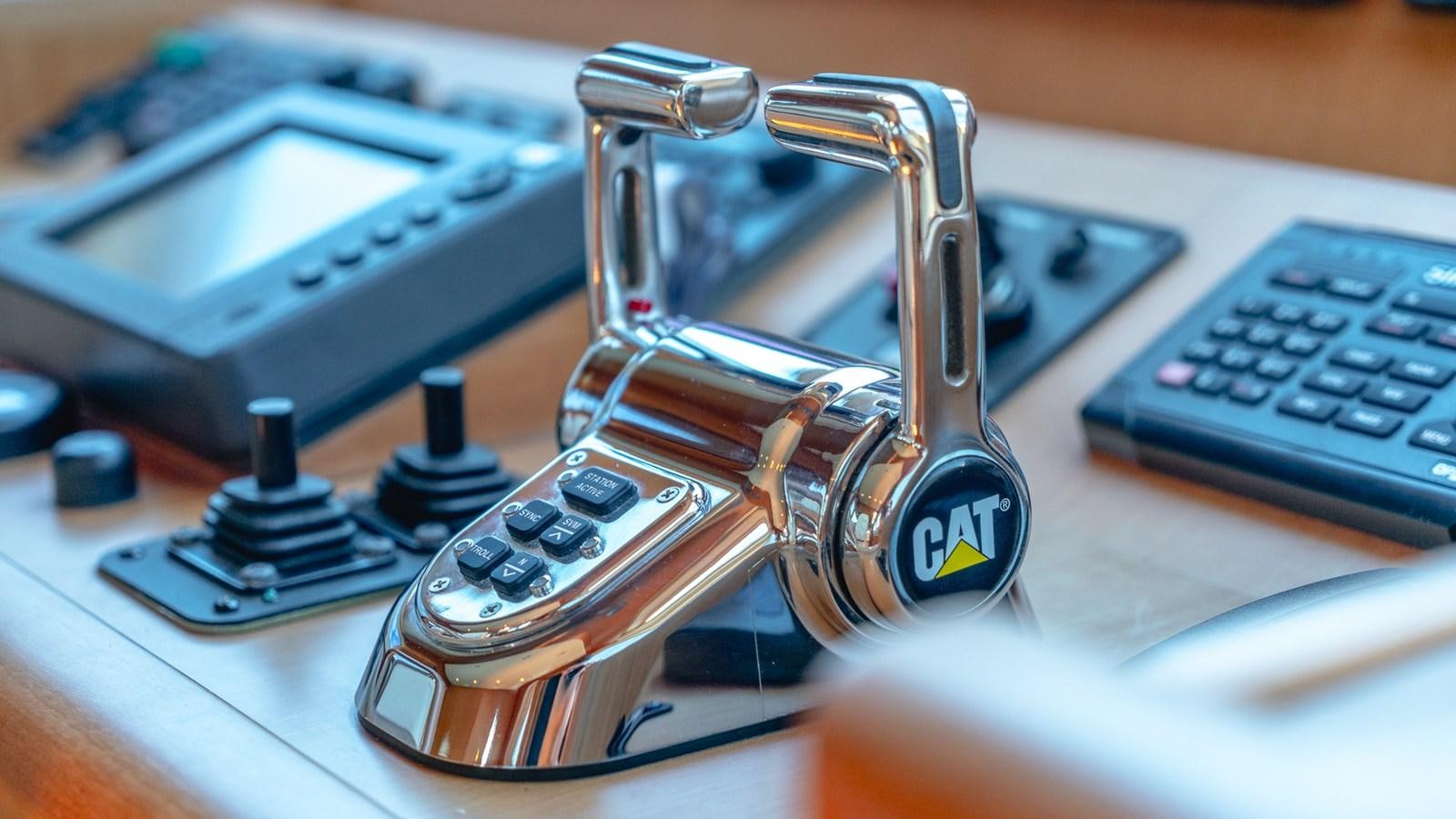 a key chain on a desk aboard CAVALLINO III Yacht for Sale