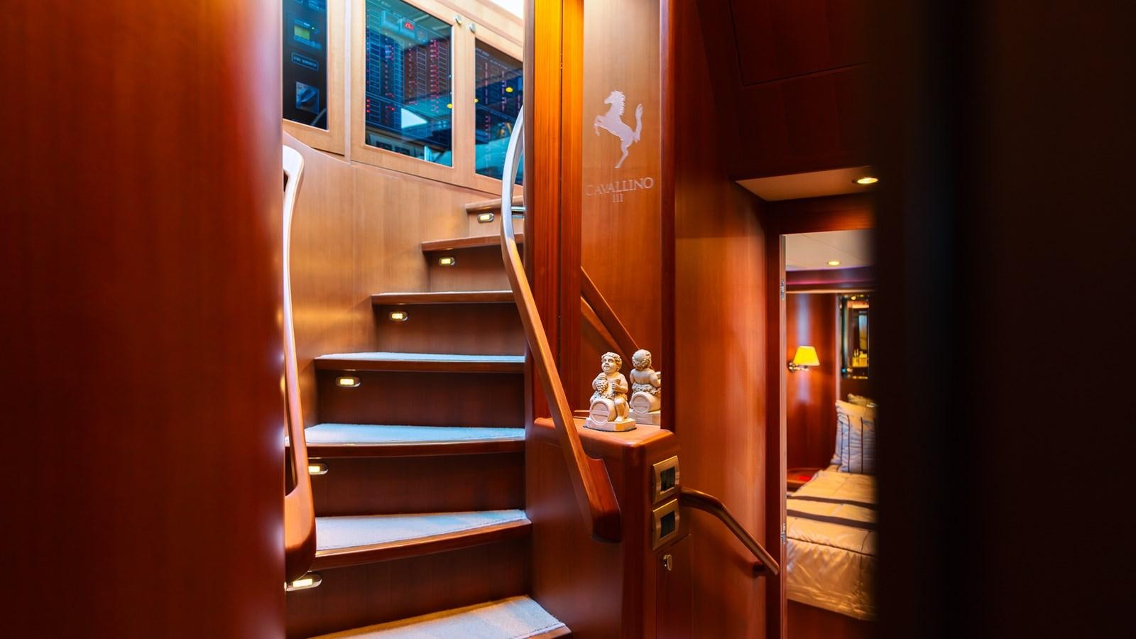 a wood door with a wood frame aboard CAVALLINO III Yacht for Sale