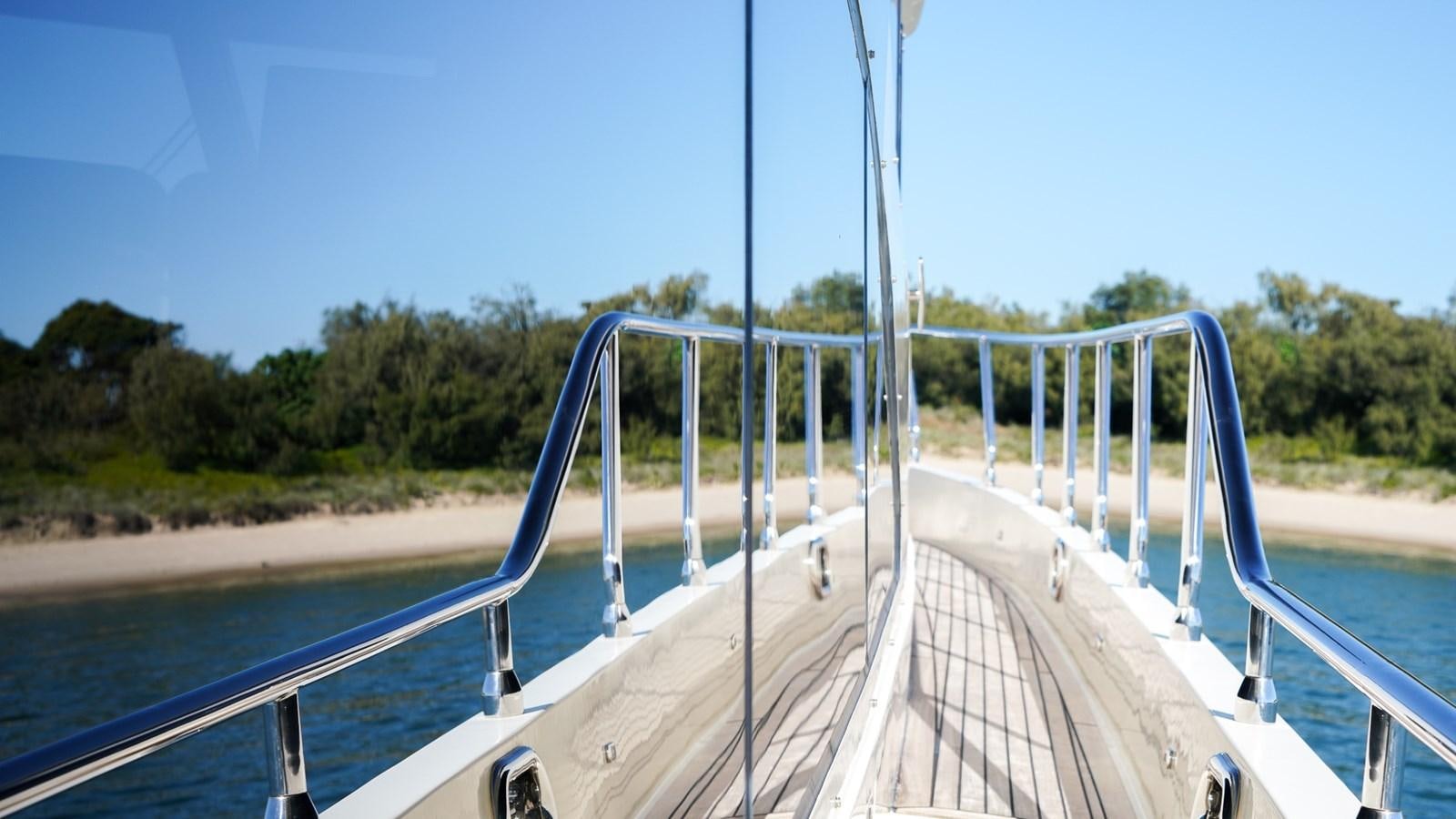 a white bridge over water aboard CAVALLINO III Yacht for Sale