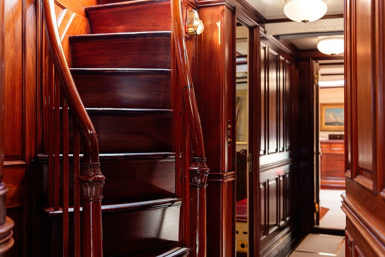 a room with wooden cabinets aboard MARIETTE OF 1915 Yacht for Sale