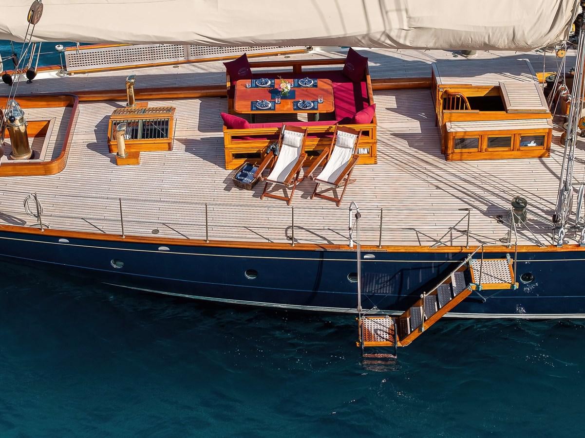 a large ship docked aboard MARIETTE OF 1915 Yacht for Sale