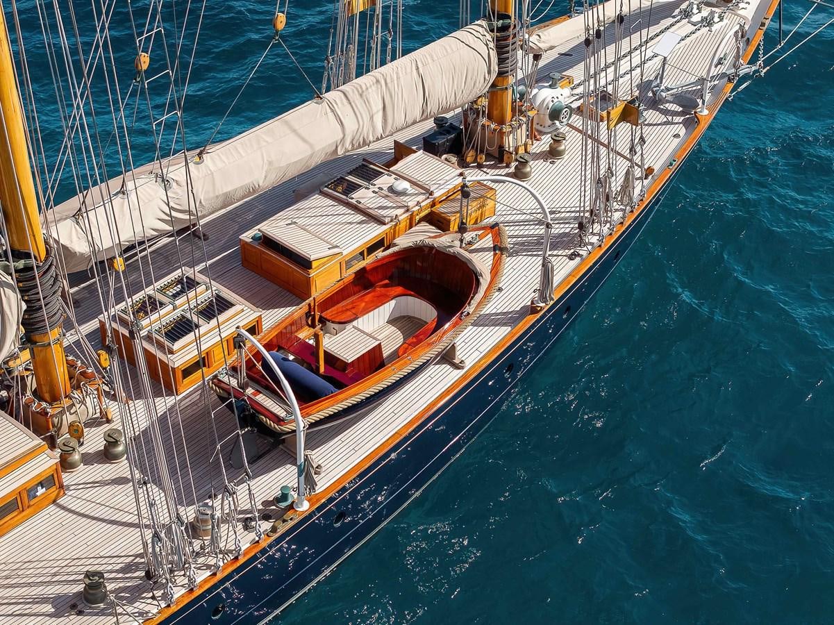 a large ship docked aboard MARIETTE OF 1915 Yacht for Sale